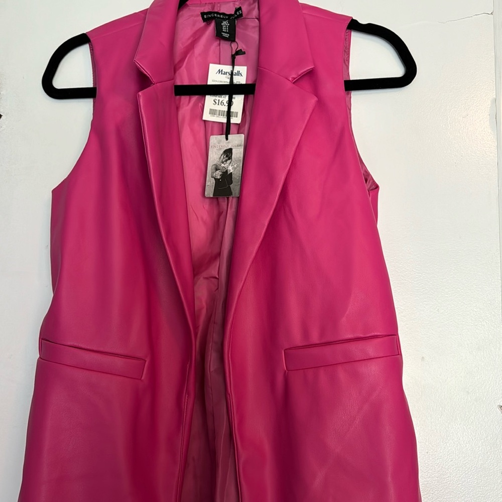 Small longline faux leather vest.